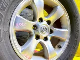 Колеса на дисках Toyota 6x139.7 c шинами Bridgestone 265/65R17