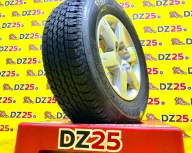 Колесо на диске Mitsubishi 6x139.7 c шиной Bridgestone 265/65R17 Колесо на диске Mitsubishi 6x139.7 c шиной Bridgestone 265/65R17