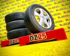 Колеса на дисках Again 5x114.3 c шинами Dunlop 205/65R15