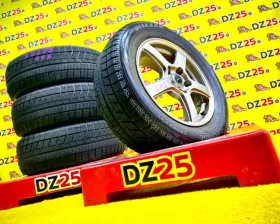 Колеса на дисках Bridgestone Toprun 5x114.3 c шинами Bridgestone 215/60R16