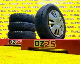 Колеса на дисках Nissan 4x114.3 c шинами Dunlop 165/80R14