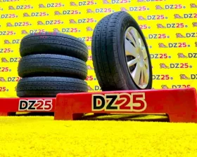 Колеса на дисках Nissan 4x114.3 c шинами Dunlop 165/80R14
