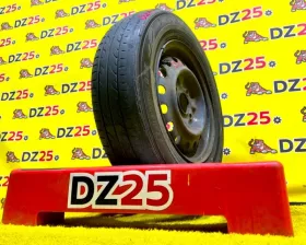 Колесо на диске Nissan 4x114.3 c шиной Dunlop 165/80R14