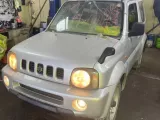 Телевизор Suzuki Jimny/Jimny Sierra/Jimny Wide 1998/Цвет Z2S 5811081A00 JB33W/JB43W G13B, передний Телевизор Suzuki Jimny/Jimny Sierra/Jimny Wide 1998/Цвет Z2S 5811081A00 JB33W/JB43W G13B, передний