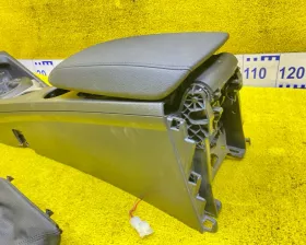 Бардачок между сиденьями BMW