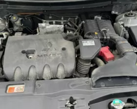 Натяжитель ремня генератора MITSUBISHI