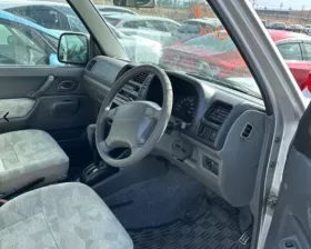 Локи Suzuki