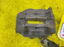 Суппорт TOYOTA TUNDRA 1999/Цвет 202 4775034040 UCK40L 2UZFE, передний левый