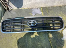Решетка радиатора TOYOTA LAND CRUISER/LAND CRUISER CYGNUS/LX470 2001/Цвет 8L4 5311160330 UZJ100/UZJ100L/UZJ100/FZJ100/FZJ105/HDJ100/HDJ100L/HDJ101/HDJ101K/HZJ105/HZJ105L 2UZFE, передняя