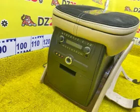 Бардачок между сиденьями CADILAC