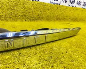 Накладка на крышку багажника Nissan