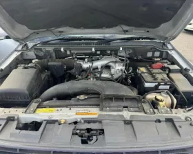 Тросик ручника MITSUBISHI