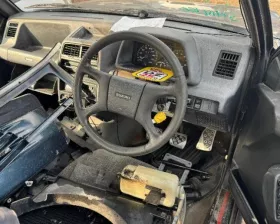 Тросик ручника SUZUKI