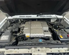 Тросик ручника MITSUBISHI
