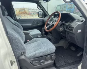 Тросик ручника MITSUBISHI