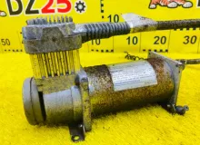 Компрессор пневмоподвески INFINITI QX56 2004/Цвет G10 534007S600 JA60 VK56DE, задний