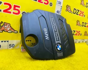 Пластиковая крышка на двс BMW