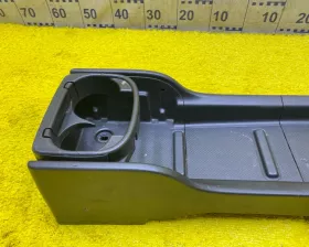 Бардачок между сиденьями Nissan