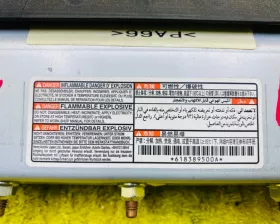 Подушка безопасности для колен Mitsubishi