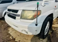 Бампер MITSUBISHI PAJERO IO 2000/Цвет W75D MR566511 H76W 4G93T, передний