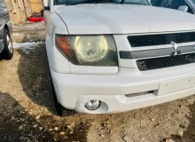 Бампер MITSUBISHI PAJERO IO 2000/Цвет W75D MR566511 H76W 4G93T, передний