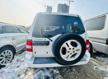 Бампер MITSUBISHI PAJERO IO 2000/Цвет W75D MR592971 H76W 4G93T, задний