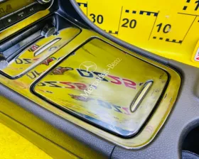 Бардачок между сиденьями Mercedes-Benz