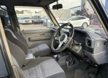 Дуйка TOYOTA LAND CRUISER 1992/Цвет 26P 5565090K0011 HZJ77HV 1HZ, передняя