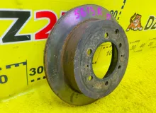 Тормозной диск TOYOTA LAND CRUISER 1992/Цвет 26P 4243160090 HZJ77HV 1HZ, задний правый