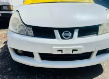 Бампер NISSAN WINGROAD 2009/Цвет QX1 F2022CV76A Y12 HR15DE, передний