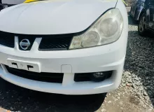 Бампер NISSAN WINGROAD 2009/Цвет QX1 F2022CV76A Y12 HR15DE, передний
