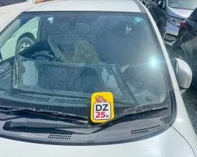 Лобовое стекло NISSAN