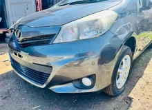 Бампер TOYOTA VITZ 2012 5211952710B1 NSP135 1NRFE, передний