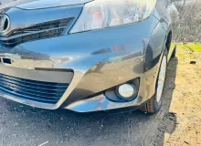 Бампер TOYOTA VITZ 2012 5211952710B1 NSP135 1NRFE, передний