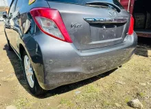 Бампер TOYOTA VITZ 2012 5215952740B1 NSP135 1NRFE, задний