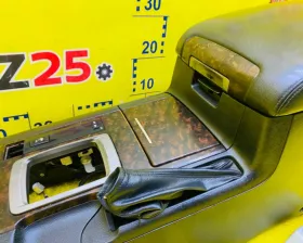 Бардачок между сиденьями Toyota