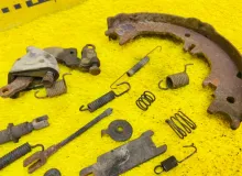 Механизм стояночного тормоза TOYOTA LAND CRUISER/LAND CRUISER CYGNUS/LX470 1999/Цвет 057 UZJ100W 2UZFE, задний левый