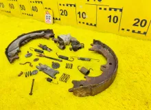 Механизм стояночного тормоза TOYOTA LAND CRUISER/LAND CRUISER CYGNUS/LX470 1999/Цвет 057 UZJ100W 2UZFE, задний левый