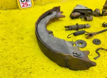Механизм стояночного тормоза TOYOTA LAND CRUISER/LAND CRUISER CYGNUS/LX470 1999/Цвет 057 UZJ100W 2UZFE, задний левый