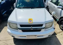 Бампер MITSUBISHI PAJERO IO 2003 MR566511 H76W 4G93T, передний