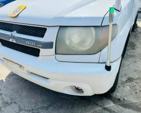 Бампер Mitsubishi