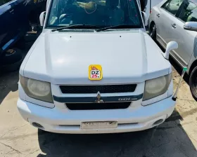 Капот Mitsubishi