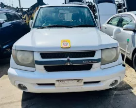 Капот Mitsubishi