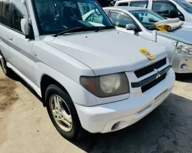 Капот Mitsubishi