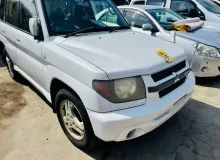 Решетка радиатора MITSUBISHI PAJERO IO 2003 MR557172 H76W 4G93T, передняя