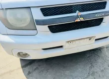Решетка радиатора MITSUBISHI PAJERO IO 2003 MR557172 H76W 4G93T, передняя