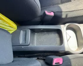 Бардачок между сиденьями Toyota