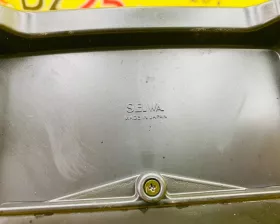 Бардачок между сиденьями Mitsubishi