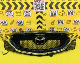 Решетка радиатора Mazda