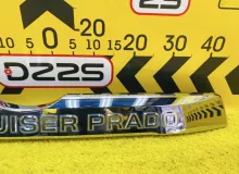 Накладка на дверь багажника TOYOTA LAND CRUISER PRADO 2021/Цвет 202 7681260220 TRJ150W/TRJ150L/TRJ150/TRJ152/TRJ155/GDJ150W/GDJ150R/GDJ150L/GDJ150/GDJ151W/GDJ151/GDJ155L/GDJ155R/GDJ155/GRJ150W/GRJ150L/GRJ150/GRJ151W/GRJ151/GRJ152/KDJ150/KDJ150L/KDJ155 2TR